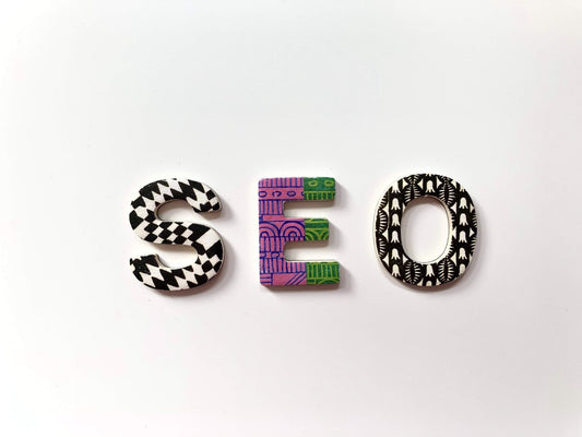 block letters s e and o with different patterns on them in front of a white background
